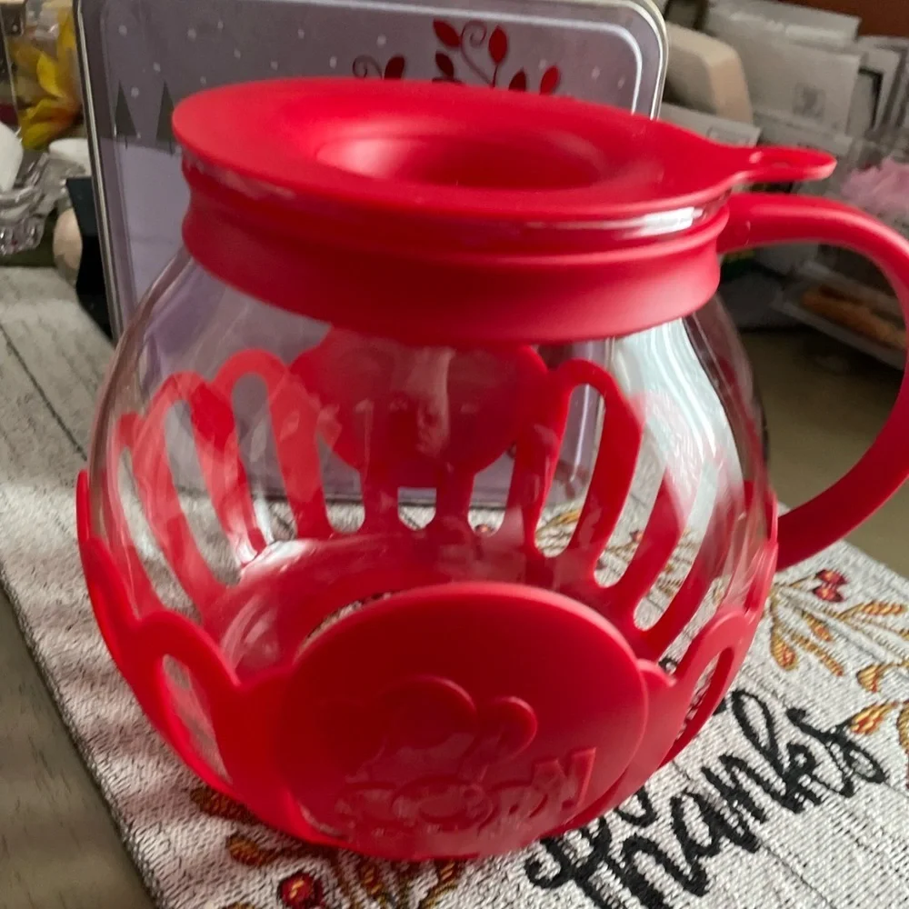Glass microwave popcorn popper , gently used if used at all , holds a large bowl